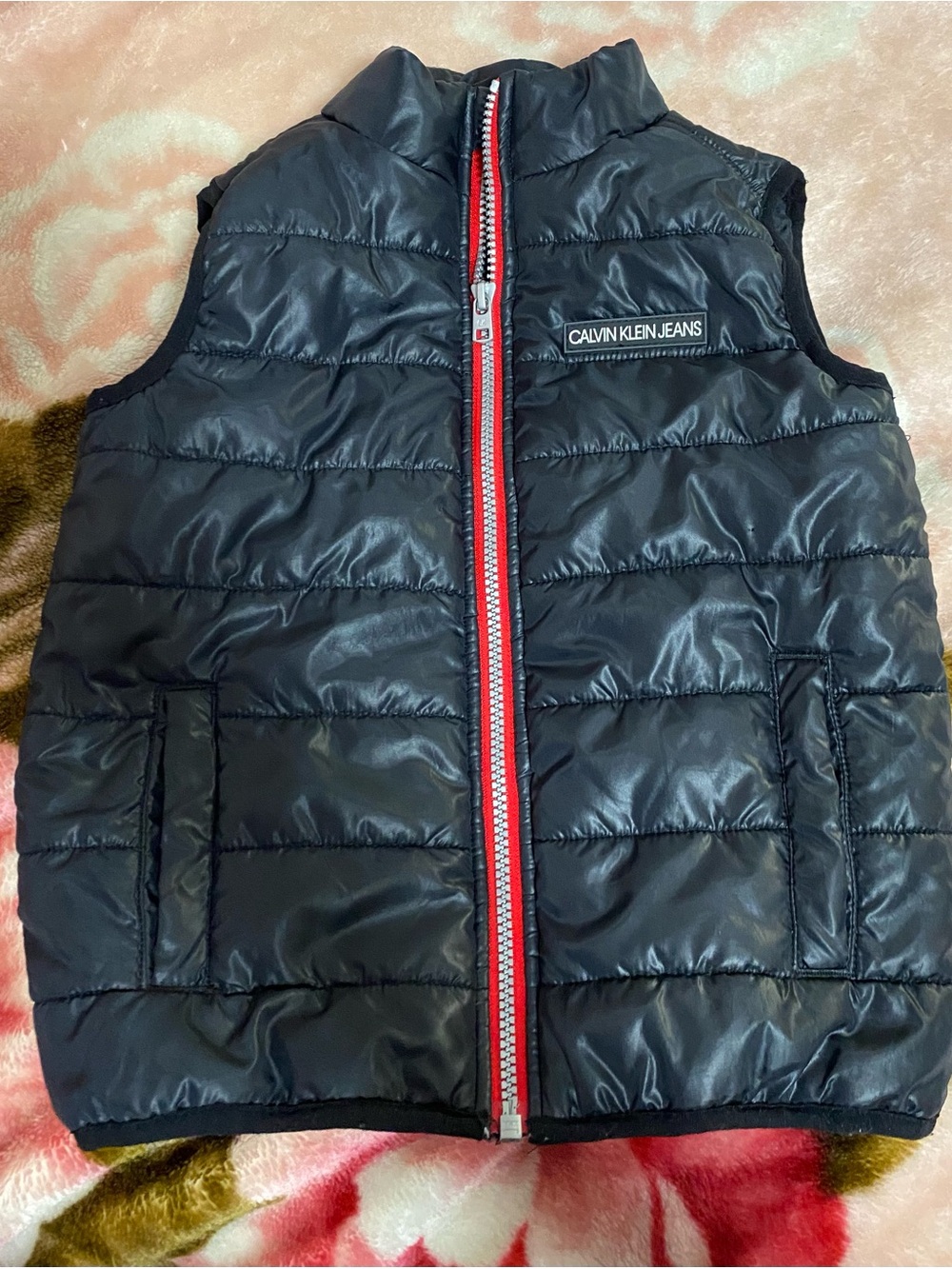 Calvin Klein Black Puffer Vest with Red Zipper Accent